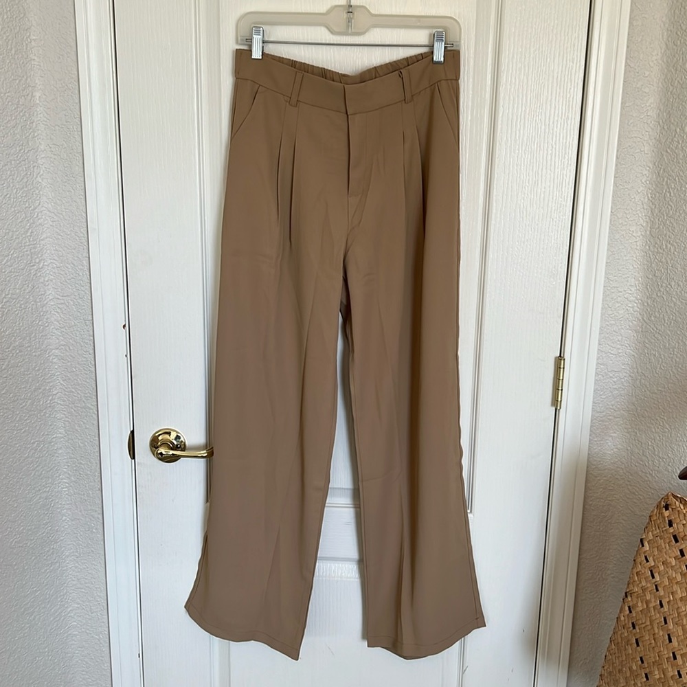 Trousers (wide leg) never worn! Tag is L but fits like a M